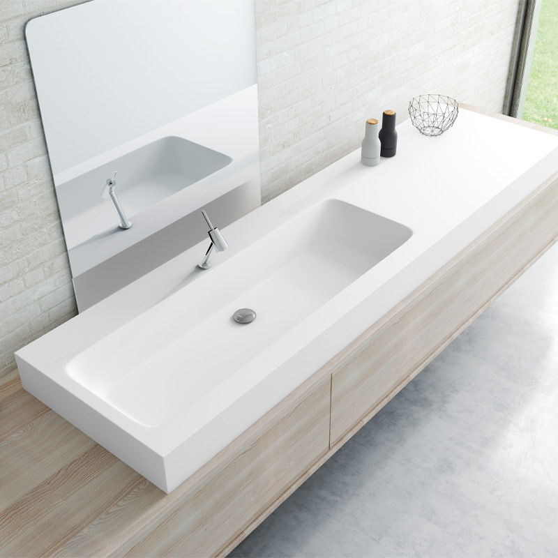 encimera a medida con lavabo en solid surface para baño CHICLANA